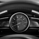 black and white car speedometer